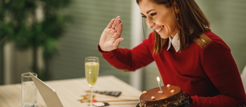 Smiling Attractive Woman Holding Birthday Cake and Have a Online Birthday Party With Friends