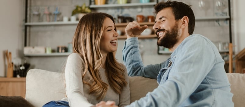 Loving Happy Couple Talking to Each Other at Home