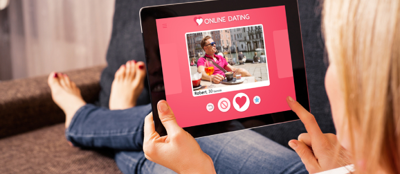 Woman Using Online Dating App on Tablet