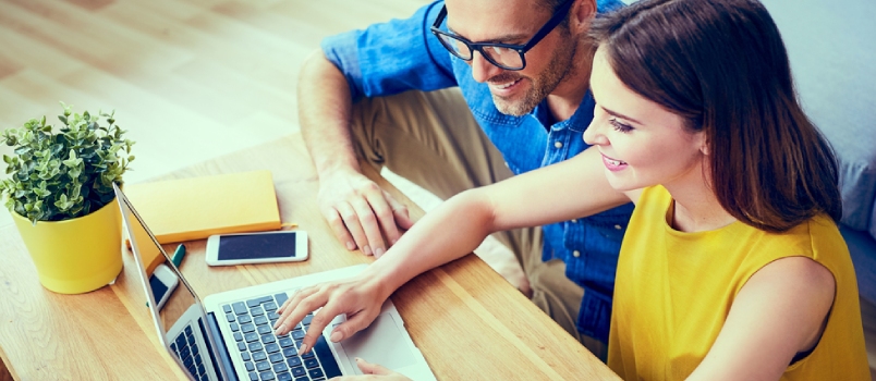 Happy Couple Doing Online Shopping Together at Home