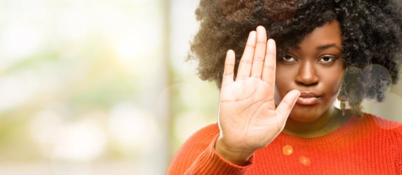 Beautiful African Woman Annoyed With Bad Attitude Making Stop Sign With Hand, Saying No