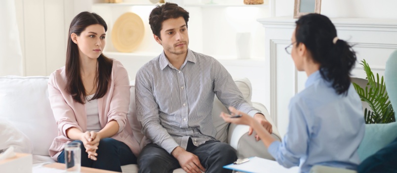Young couple visiting therapist