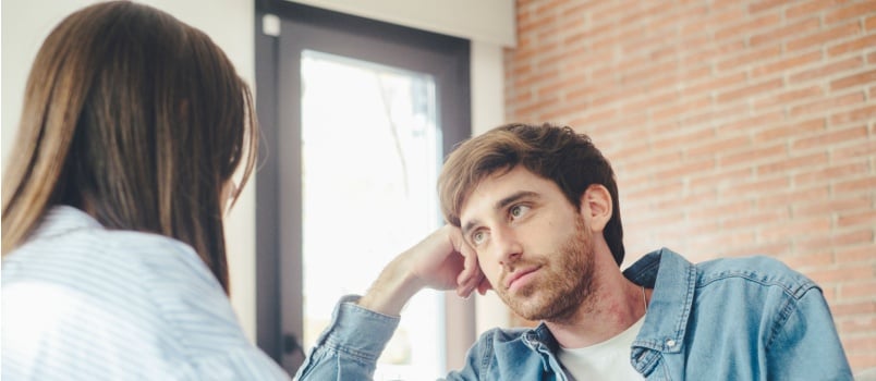 Man listening to woman