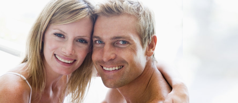 Man and Women Cuddling Indoors