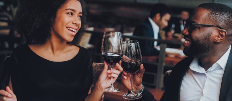 African American Couple Dating in Restaurant. Romantic Couple in Love Dating