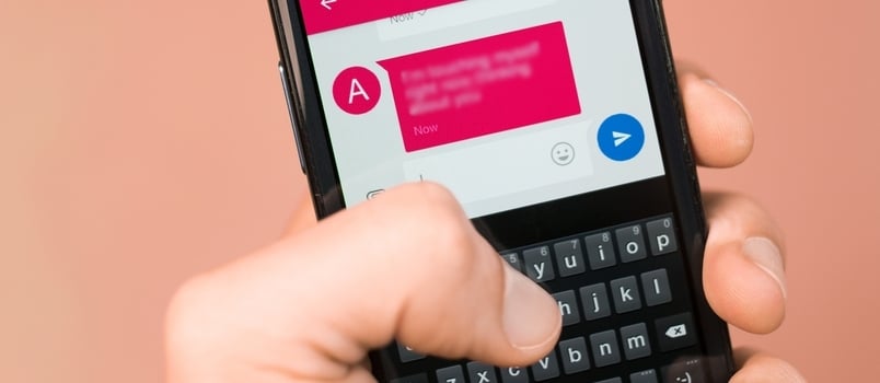 Close men hand typing message