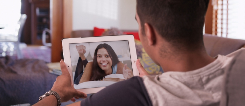 man video calling over tab at home