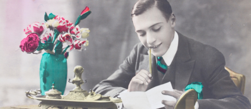 Old Photo of Young Man Writting a Letter