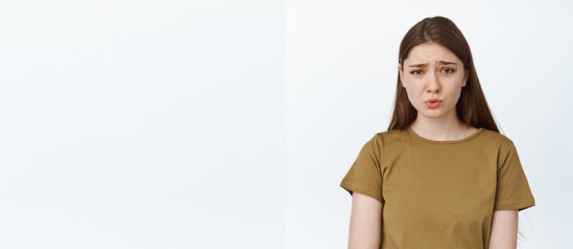 Worried Women With White Background Studio Shot