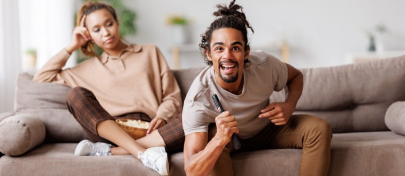 Young couple watching tv