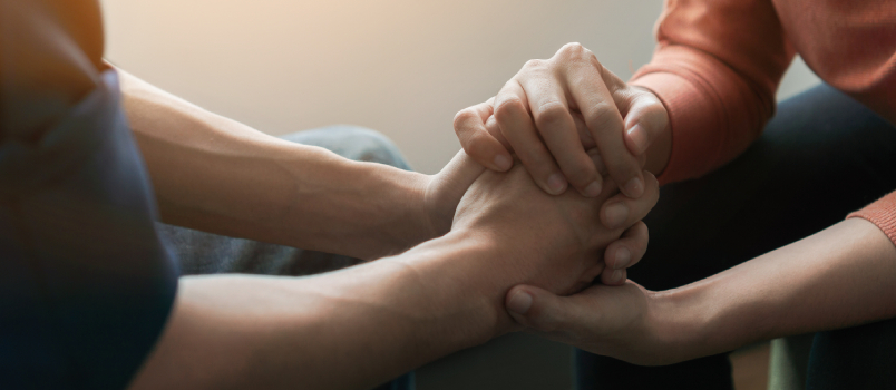 couple comforting each other