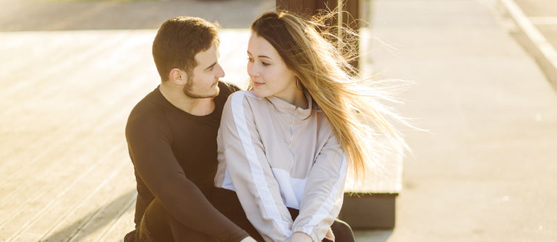 Happy couple sitting together