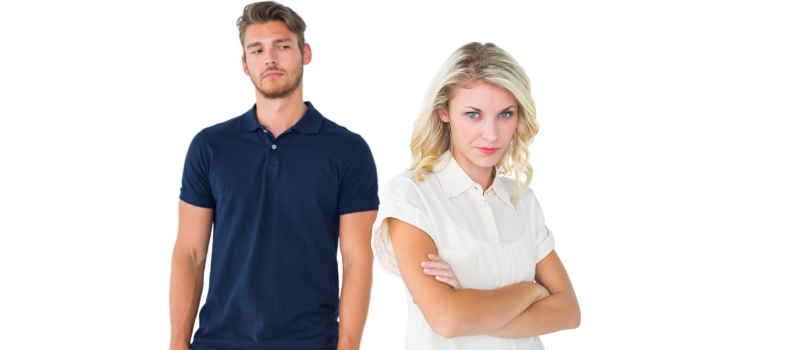 Men and women standing alone after fight studio shot