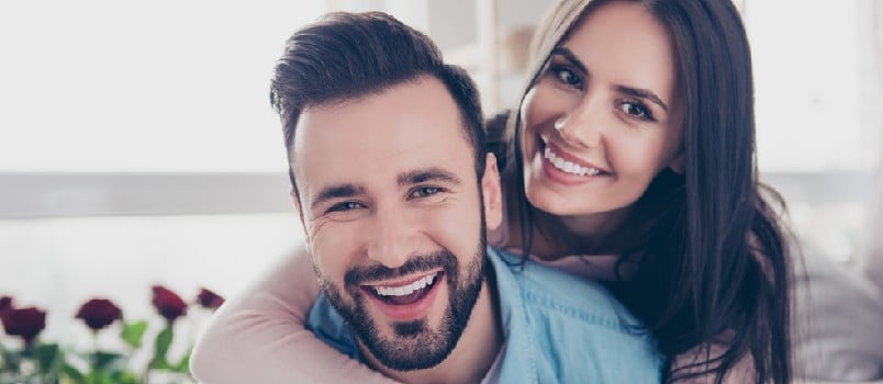 Close up photo of cheerful excited glad careless happy with toothy beaming smile brunette attractive woman and with stylish hairdo man,