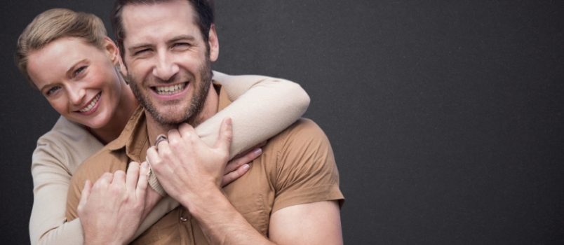 happy smiling couple studio shot