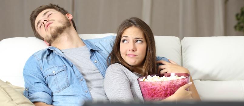 Couple With Incompatibility Problem Watching Tv