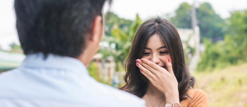 Young happy couple looking at each other