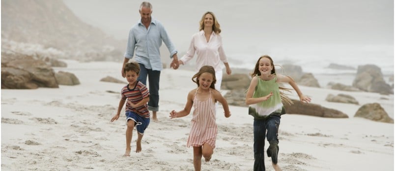 Family having fun time on beach