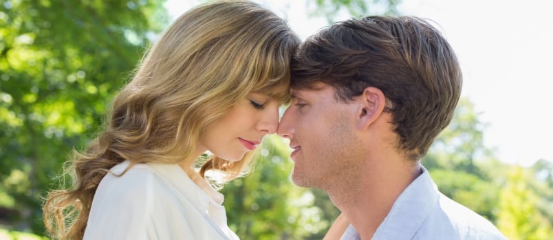 Couple Facing Each Other in Park