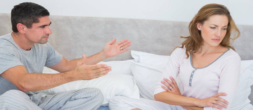 Couple fighting in bedroom