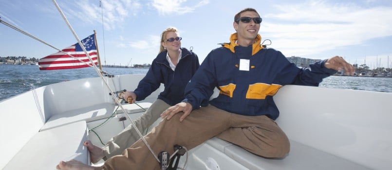 Young couple enjoying at boat