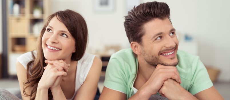 Happy Thoughtful Young Couple