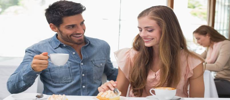 Couple having coffee in restaurant