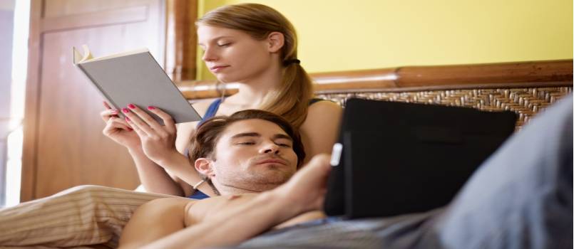 Young couple lying on the bed