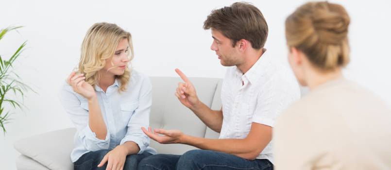 Couple in a meeting with a financial adviser