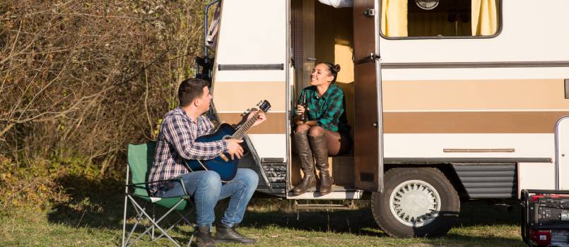 Happy couple enjoying in mountains