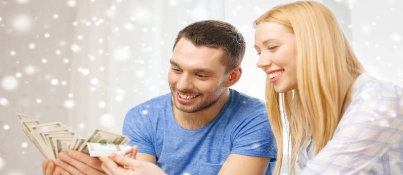 Happy couple with money