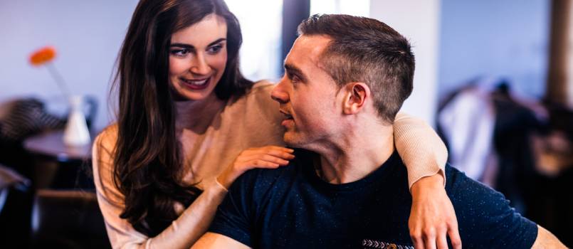 Couple talking in a bar