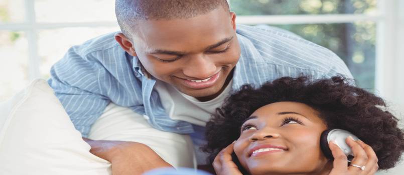 Smiling couple in a living room