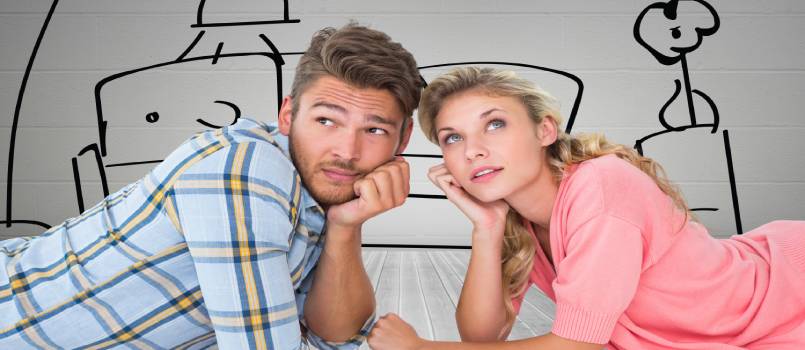 Attractive young couple lying and thinking