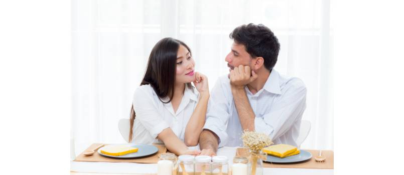 Couple taking while having lunch