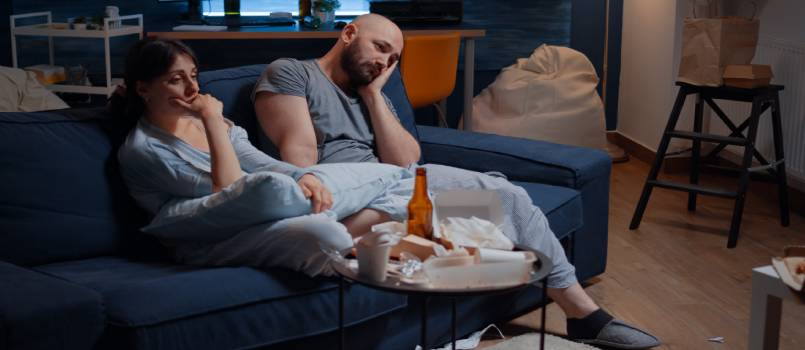 Couple sitting on a couch