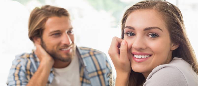 Man looking at smiling women