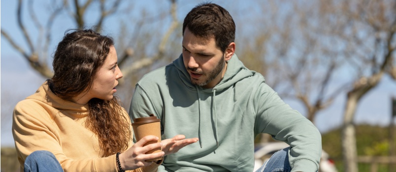Couple arguing in park