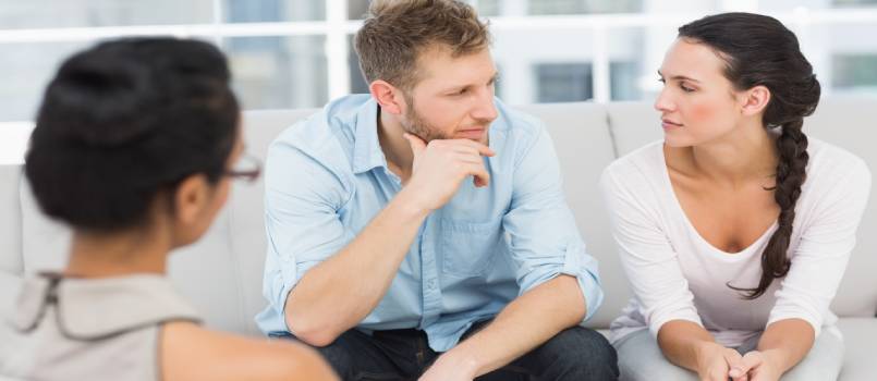 Unhappy couple at therapist session