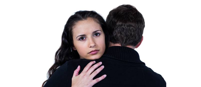 Sad couple hugging