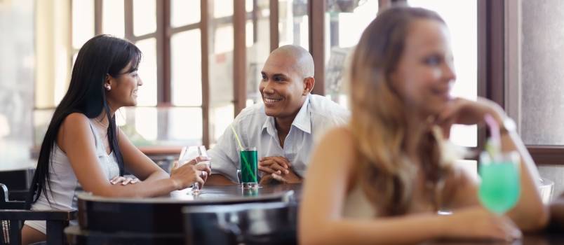 Man and woman dating at pub