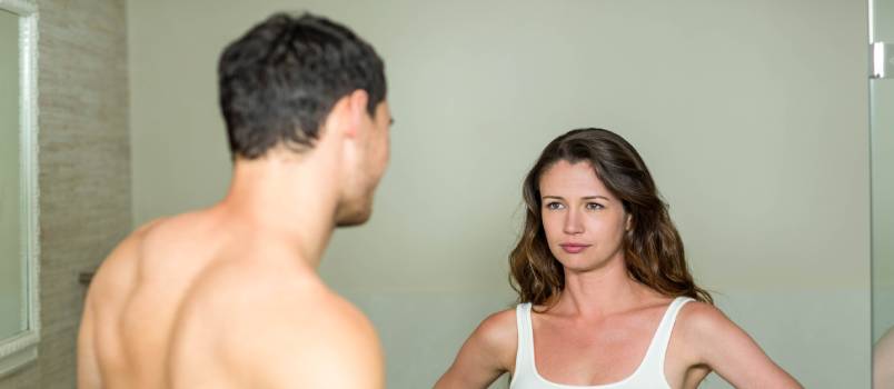 Sad woman looking at man