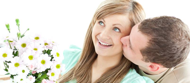 Man giving a bouquet to his girlfriend