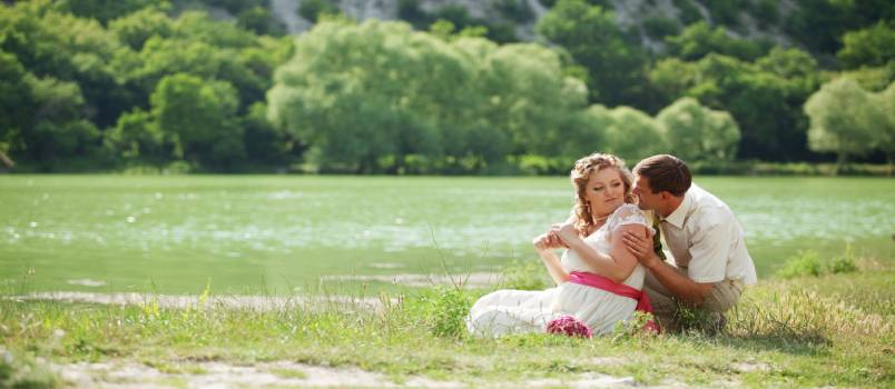 Couple sitting near beach