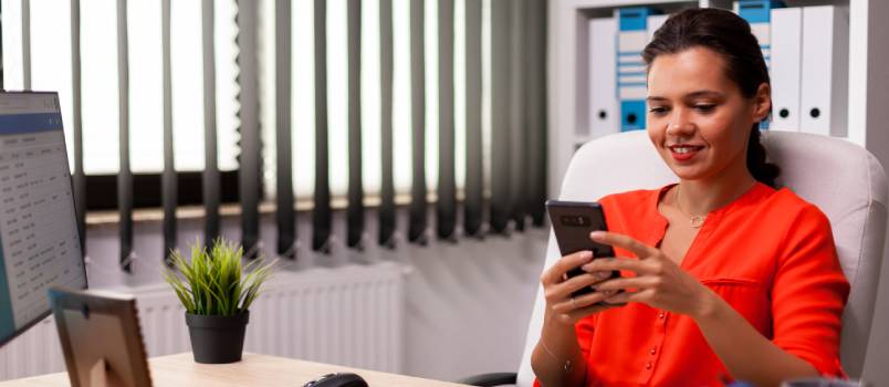 Business woman texting