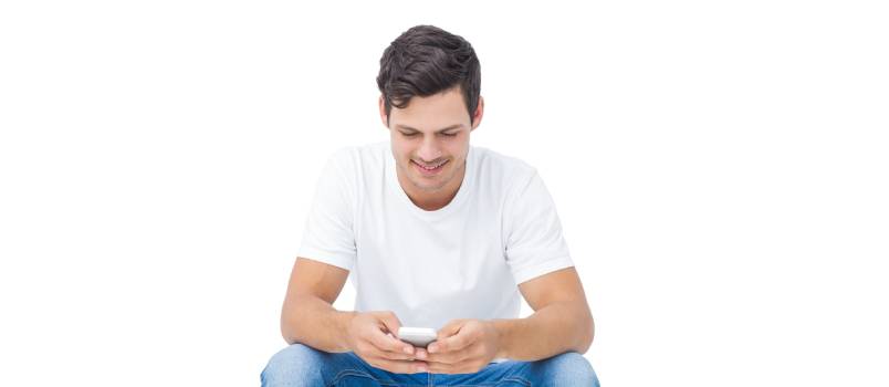 Handsome man texting