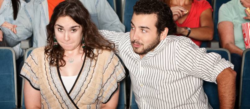 Guy flirting theater