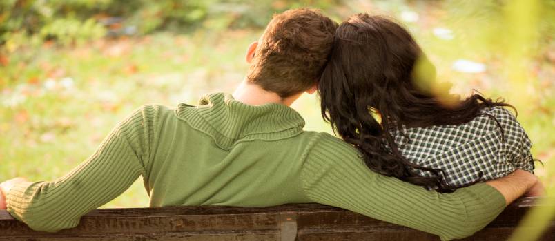 Couple sitting in a park