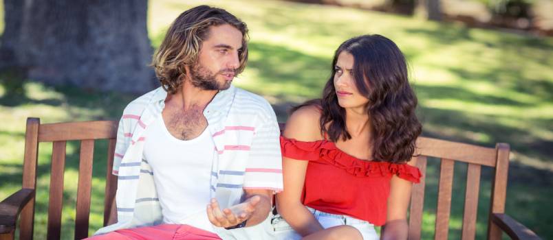 Couple arguing in park