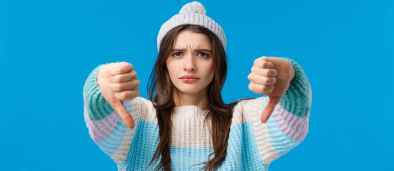 Woman showing a bad idea